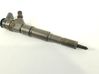 Fuel injector 7788609