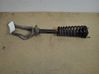 Front shock absorber with coil spring 