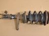 Front shock absorber with coil spring 