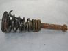 Front shock absorber with coil spring 