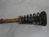 Front shock absorber with coil spring 