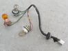 Tail light bulb cover holder 