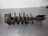 Front shock absorber with coil spring 