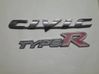 Manufacturers badge/model letters 