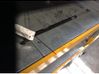 Rear window strut damper 