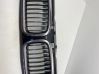 Front bumper upper radiator grill 7037727