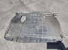 Center/middle under tray cover 