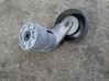 Alternator belt tensioner 