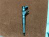 Fuel injector 7794435