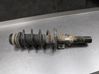 Front shock absorber with coil spring 