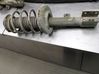 Front shock absorber with coil spring 
