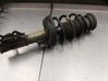 Front shock absorber with coil spring 