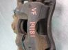 Caliper de freno delantero 