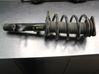 Front shock absorber with coil spring 