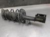 Front shock absorber with coil spring 