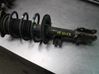 Front shock absorber with coil spring 