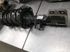 Front shock absorber with coil spring 