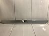 Trunk door license plate light bar 
