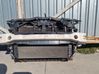 Radiator support slam panel 