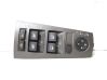 Electric window control switch 6917105