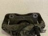 Caliper de freno delantero 