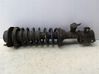 Front shock absorber with coil spring 