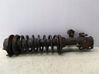 Front shock absorber with coil spring 