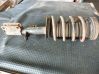 Front shock absorber with coil spring 