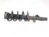 Front shock absorber with coil spring 