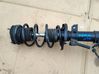 Front shock absorber with coil spring 