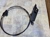 Fuel cap flap release cable 