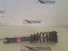 Front shock absorber with coil spring 