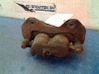Caliper de freno delantero 