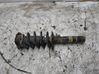 Front shock absorber with coil spring 