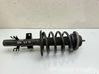 Front shock absorber with coil spring 