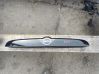 Trunk door license plate light bar 