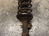 Front shock absorber with coil spring 