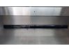 Front door trim bar 