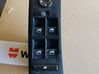 Electric window control switch 6962508