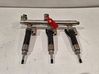 Fuel injector 166000786R