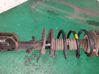 Front shock absorber with coil spring 