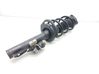 Front shock absorber with coil spring 