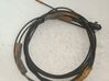 Cable de apertura de la tapa del depósito de combustible 002220