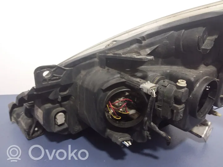 Renault Clio III Phare frontale 7701070492