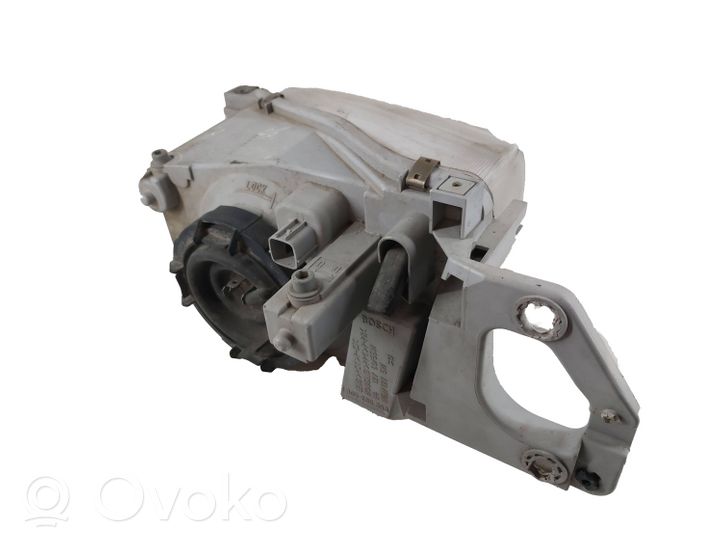 Mazda 323 F Lampa przednia 1305235393