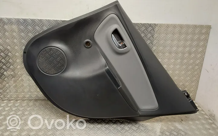 Toyota Yaris Rivestimento del pannello della portiera posteriore 676140D550