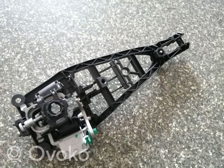 Opel Astra H Klamka/wspornik zewnętrzny drzwi przednich 24463524