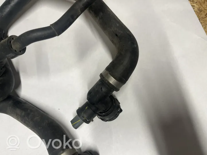 Volkswagen Jetta VII Tuyau de liquide de refroidissement moteur 5QM121049E