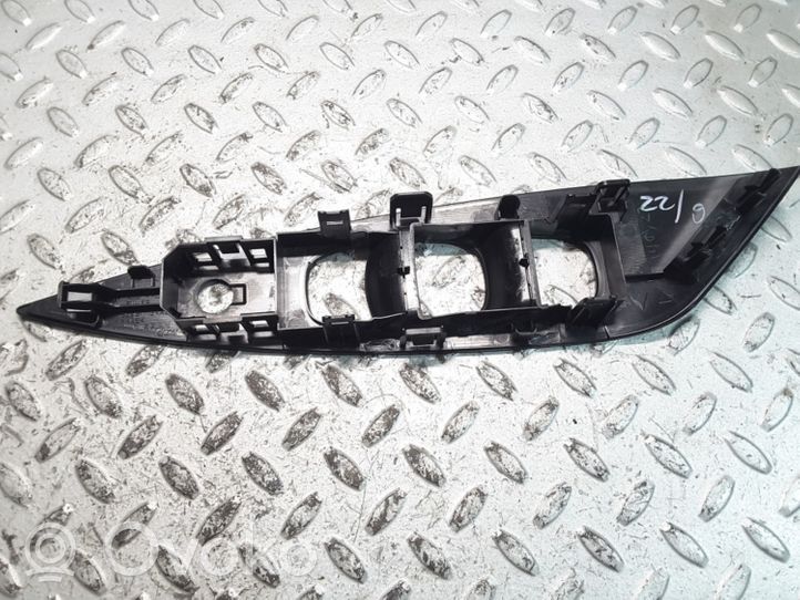 Nissan Leaf I (ZE0) Rivestimento pulsantiera finestrino della portiera anteriore 809613NA0A