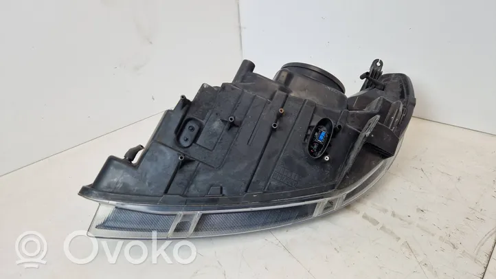 Saab 9-3 Ver2 Lampa przednia 12778684